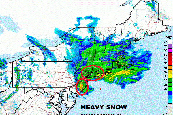 Heavy Snow Tapering Off West To East