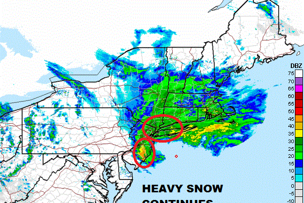 Heavy Snow Tapering Off West To East
